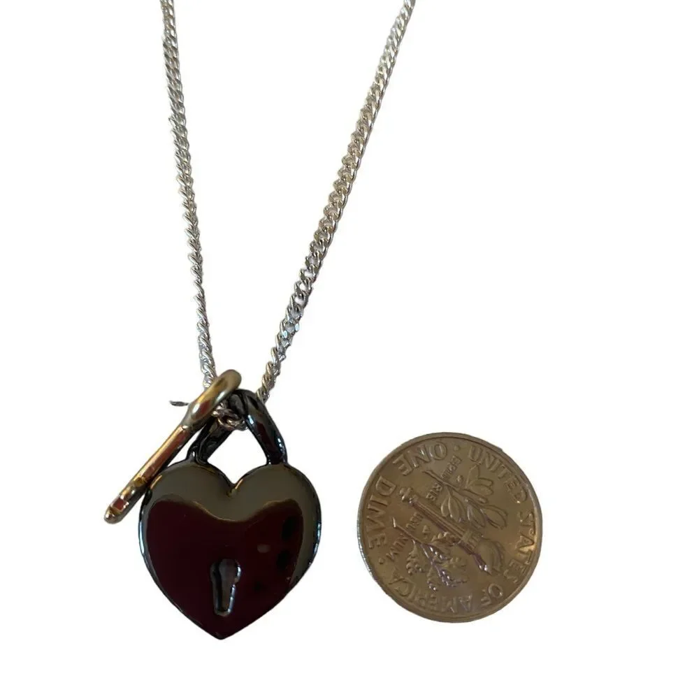 Gun Metal Heart Shaped Lock w/ Gold Tone Key on Serpentine Chain.